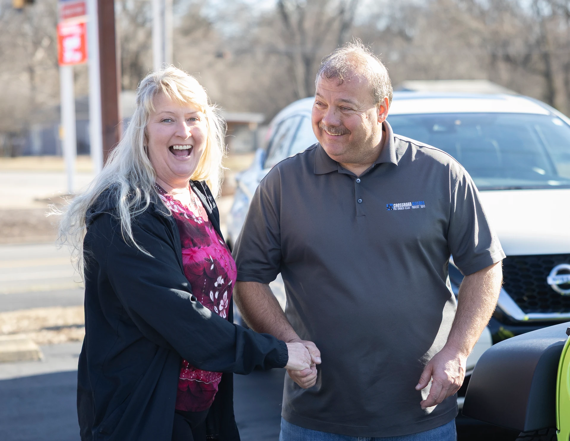 very happy clients at crossroad motors